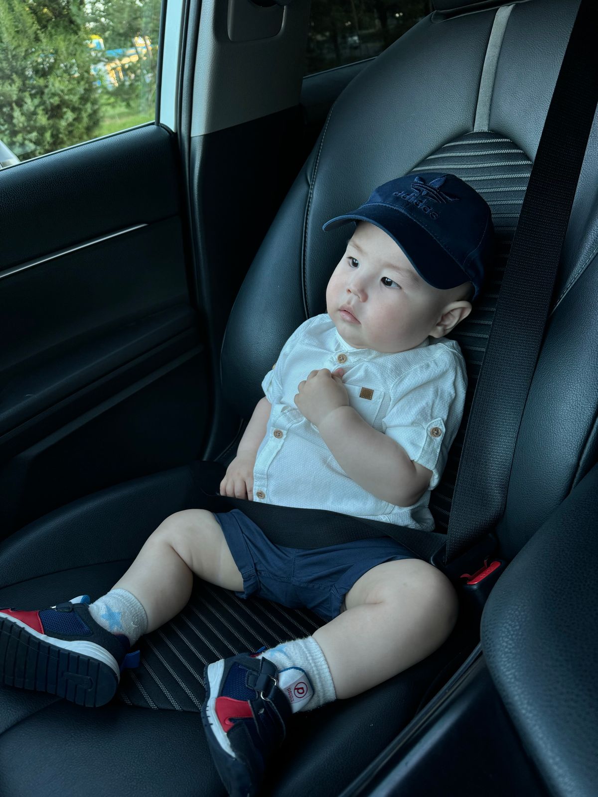 Convertible vs infant car seat - toddler seated safely in a car seat