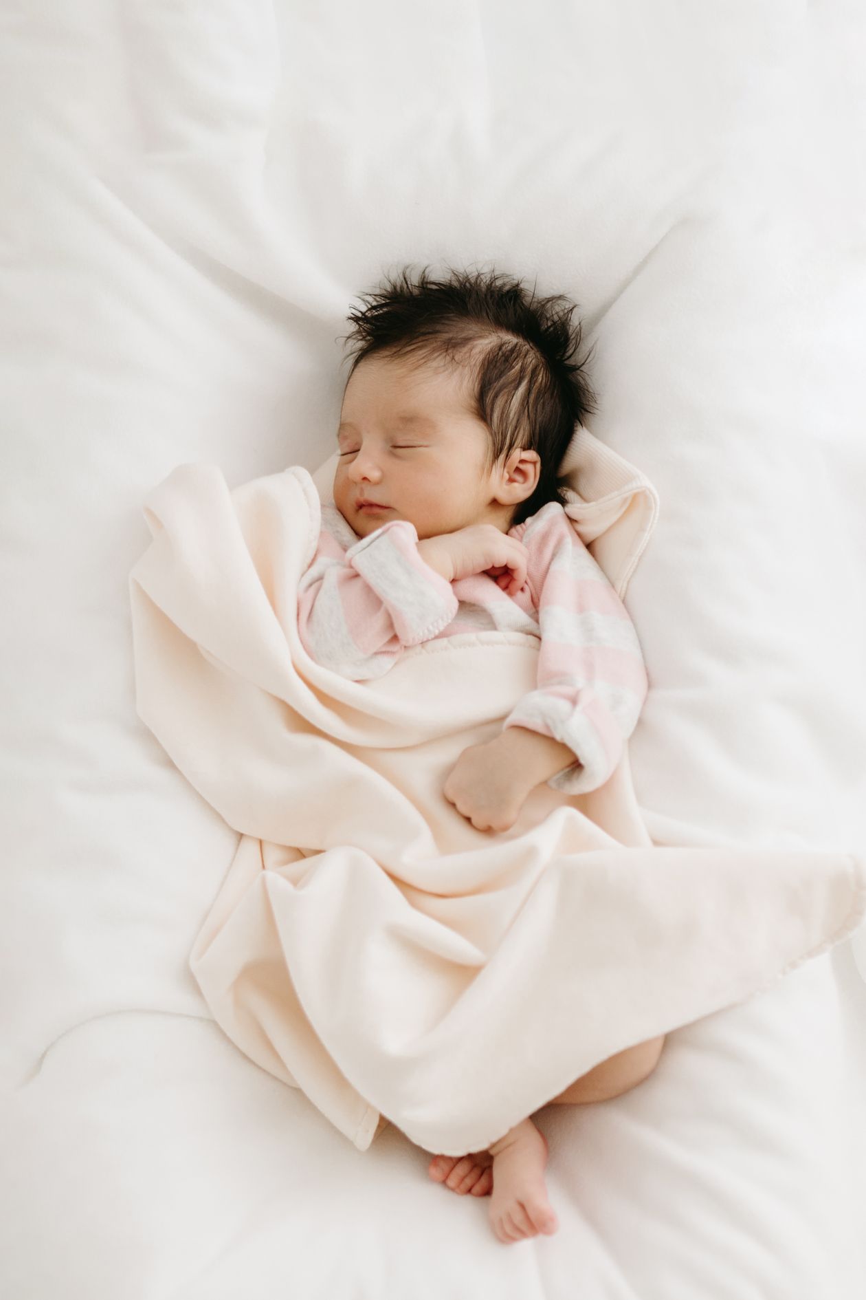 Baby on a play blanket